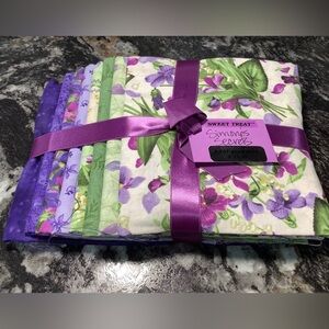 8 fat quarters 100% cotton, perfect for quilting or crafting.